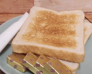 Toast (2 slices) with build your own breakfast options.